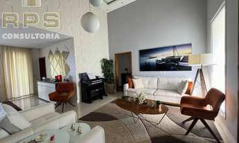 Imagem 5: Com um total de 04 suítes magníficas, sala de estar e sala de jantar espaçosas, uma cozinh