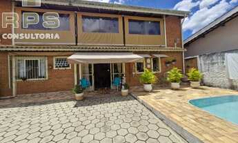 Imagem 2: Sobrado com piscina e 2 suítes, sendo uma na parte térrea, pertinho da Geronimo de Camargo