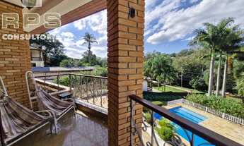 Imagem 2: Casa com 5 suítes no Palavra da vida, piscina, adega, sauna e bunker com passagem secreta