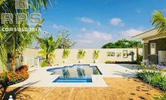 Imagem 3: Casa totalmente térrea no condomínio flamboyant, com 5 suítes, repleta de salas, área de