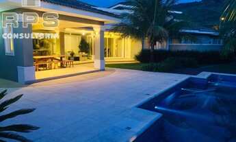 Imagem 7: Casa totalmente térrea no condomínio flamboyant, com 5 suítes, repleta de salas, área de