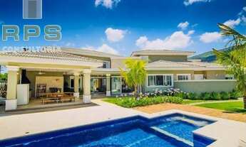 Imagem 5: Casa totalmente térrea no condomínio flamboyant, com 5 suítes, repleta de salas, área de