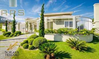 Imagem 4: Casa totalmente térrea no condomínio flamboyant, com 5 suítes, repleta de salas, área de