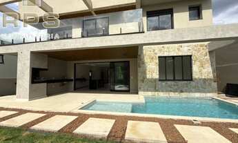 Imagem 7: Casa de alto padrão no Condomínio Reserva São Nicolau conta com 300m2, 4 suítes, salas amp