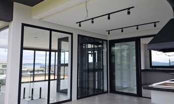 Imagem 7: 3 suítes (1 suíte master com closet, 1 suíte no térreo) Home office Sala ampla envidraçada