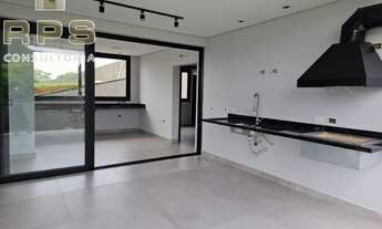 Imagem 6: 3 suítes (1 suíte master com closet, 1 suíte no térreo) Home office Sala ampla envidraçada