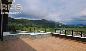 Imagem 2: 3 suítes (1 suíte master com closet, 1 suíte no térreo) Home office Sala ampla envidraçada