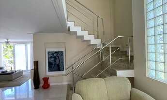 Imagem 5: CASA 5/4 COM 3 SUÍTES DUPLEX EM ALPHAVILLE 1, FINAMENTE DECORADA COM PÉ DIREITO DUPLO!