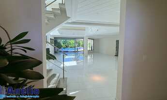 Imagem 3: Casa a venda no condomínio Jardim Acapulco com boa localização próxima ao mercado contendo