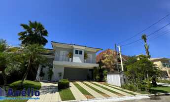 Imagem 2: Casa a venda no condomínio Jardim Acapulco com boa localização próxima ao mercado contendo