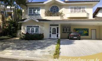 Imagem: Uma casa de alto padrão, com acabamentos