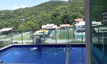 Imagem 2: Confortável apto com 02 suítes, localizado na praia de Bombas. Prédio com piscina