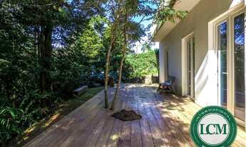 Imagem 3: Maravilhosa casa integrada a uma extensa área verde