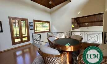 Imagem 7: Casa com vista para a represa, deck privativo e garagem de barco