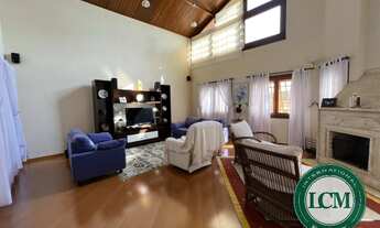 Imagem 2: Casa com vista para a represa, deck privativo e garagem de barco