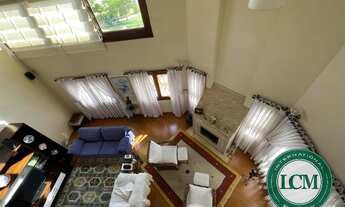 Imagem 5: Casa com vista para a represa, deck privativo e garagem de barco