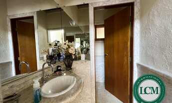 Imagem 3: Casa com vista para a represa, deck privativo e garagem de barco