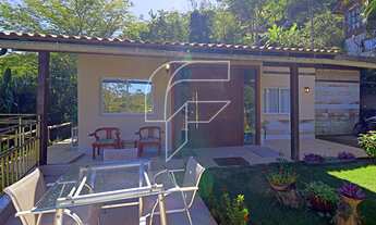 Imagem 3: Casa de 4 quartos, lazer privativo com piscina, churrasqueira, rodeado pela Mata Atlântica