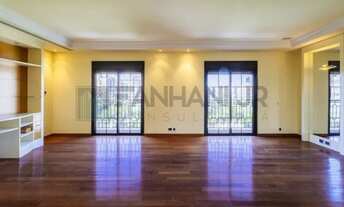 Imagem 7: Com uma área privativa de 315m2, este apartamento luxuoso conta com um espaçoso living par