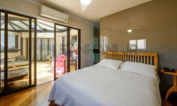 Imagem 3: Cobertura Duplex de tirar o fôlego com vista 360º para os Jardins, oferecendo uma combinaç