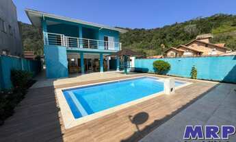 Imagem 2: Casa a venda em Caraguatauba com 5 dormitórios em condomínio, próximo a Praia da Mococa