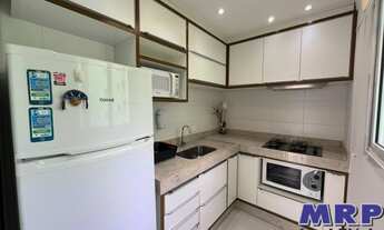 Imagem 6: Apartamento com dois dormitórios em Caraguatatuba. Praia do Indaiá. Com varanda gourmet