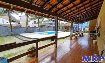 Imagem 2: Casa em Ubatuba, na praia do Sapê. Casa com piscina. Tem escritura
