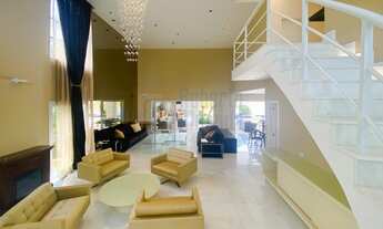 Imagem 5: Magnífica Mansão à Venda no Condomínio Mansões de 1500m² com 4 Suítes Salão 4 para Ambient