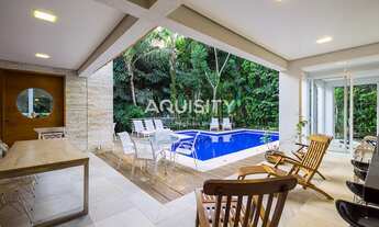 Imagem 3: Belíssima casa a venda na praia do Iporanga Guarujá, 5 suítes, piscina com deck, salão de