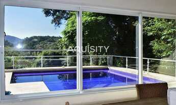 Imagem: Casa com piscina à venda no condomínio