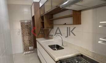 Imagem 2: Apto de 67 m² com 2 dts, 1 suíte com vista para o bairro. Repleto de armários. Sala com do