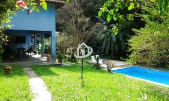 Imagem: Condomínio de poucas casas, muito verde