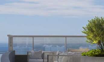 Imagem: Uma embarcação urbana à beira-mar, a