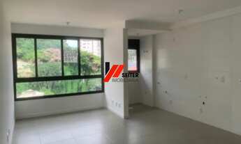 Imagem 2: Apartamento de dois dormitórios com suite à venda na Carvoeira em Florianópolis