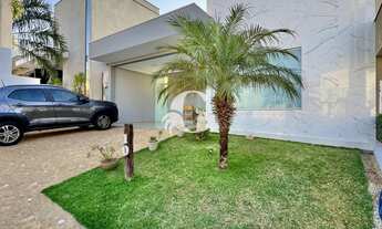 Imagem 3: Casa de alto padrão em condomínio fechado com 2 quartos, 1 suíte, 2 salas e 4 vagas de gar