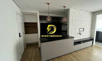 Imagem 6: 2 dormitórios, sendo 1 suíte e 2 vagas de garagem. Sacada com churrasqueira. Biografia Vil