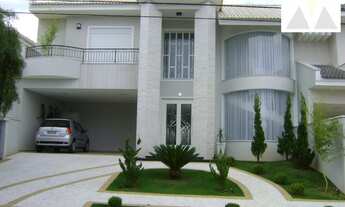 Imagem: 5 dormitórios, 5 suíte, 4 vagas na garagem