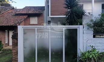 Imagem 3: Imperdível casa à venda em Porto Alegre-RS, bairro Ipanema! 3 quartos, 3 suítes, 2 salas
