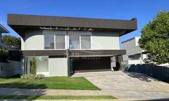 Imagem: 4 dormitórios, 4 suíte, 6 vagas na garagem