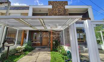 Imagem: Sobrado 3 Dormitórios com Living com Lareira