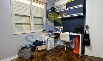 Imagem 6: Santos vende apartamento 2 dormitórios de 51,51m², living, cozinha, banheiro, vaga rotati