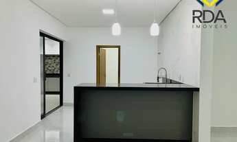 Imagem 6: Venha conhecer essa incrível casa que está esperando por você! Com três suítes, sendo uma