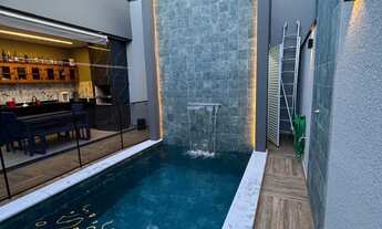 Imagem 7: Casa de 3 dormitórios, sendo 1 suíte, com sala e cozinha com pé direito alto, cozinha plan