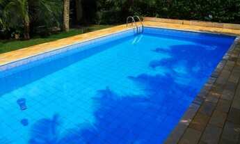 Imagem 3: CASA 4 DORMS. SENDO 3 SUÍTES, CASA COM PISCINA A POUCOS METROS DA PRAIA DENTRO DE CONDOMÍN