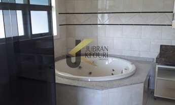 Imagem 2: Casa à venda em Valinhos, 3 dormitórios (suíte com closet) e 4 garagens. Living para 3 amb