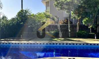 Imagem 2: Casa à venda no Alphaville com 5 dormitórios sendo 4 suites e living pra varios ambientes