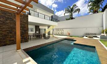 Imagem 1: Casa à venda em condomínio na região do Alphaville com 4 suítes, lazer comum e garagem par