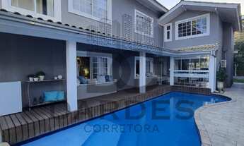 Imagem: CASA COM VAGA NAUTICA 3 SUÍTES PISCINA