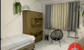 Imagem 3: Apartamento à venda em Praia Grande Mobiliado em frente ao mar com 1 quarto, sala com cozi