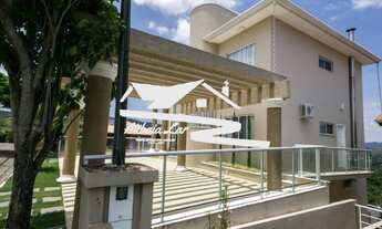 Imagem 4: Casa em estilo Neo clássico, nova com 4 suítes todas com armários planejados e ar condicio